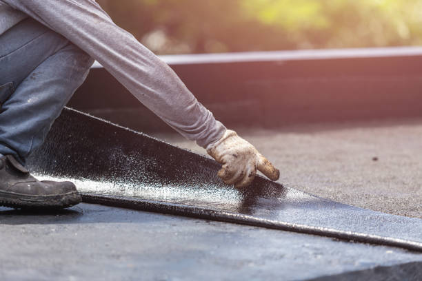 Professional Waterproofing technician working in Georgetown, KY